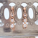 Playful White Diamond Rose Gold Drop Earrings