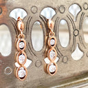 Playful White Diamond Rose Gold Drop Earrings