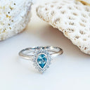 Radiant Pear Cut Aquamarine with Diamond Halo Ring