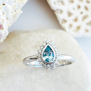 Radiant Pear Cut Aquamarine with Diamond Halo Ring