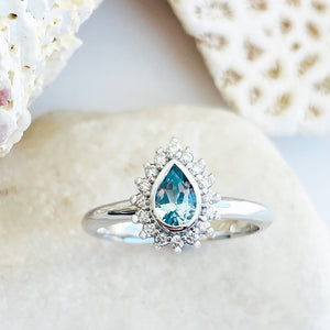 Radiant Pear Cut Aquamarine with Diamond Halo Ring