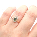 Radiant Pear Cut Green Tourmaline with Diamond Halo Ring