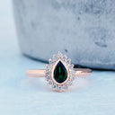 Radiant Pear Cut Green Tourmaline with Diamond Halo Ring