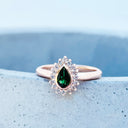 Radiant Pear Cut Green Tourmaline with Diamond Halo Ring