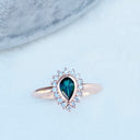 Radiant Pear Cut Green Tourmaline with Diamond Halo Ring