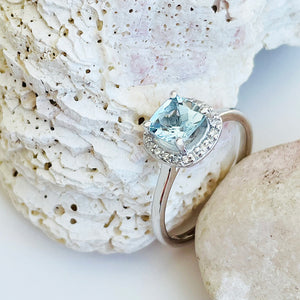 Raised Cushion Cut Aquamarine and Diamond Halo Ring⁠