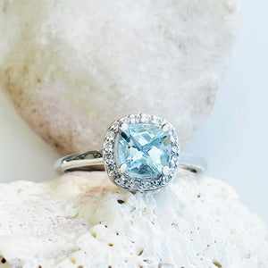 Raised Cushion Cut Aquamarine and Diamond Halo Ring⁠