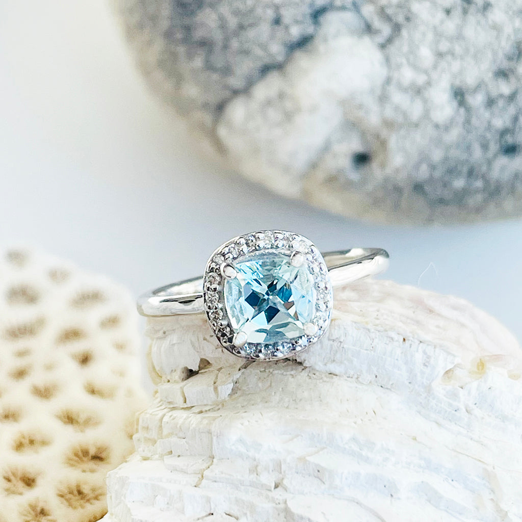 Raised Cushion Cut Aquamarine and Diamond Halo Ring⁠