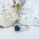 Raised Cushion Cut Black Diamond with Diamond Halo Ring