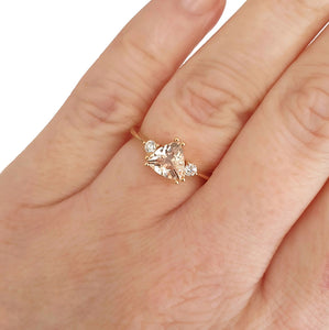Rose Gold Double Claw Trilliant Cut Morganite With Diamond Shoulder Highlight Ring