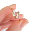 Rose Gold Double Claw Trilliant Cut Morganite With Diamond Shoulder Highlight Ring