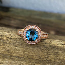 Rose Gold London Blue Topaz Ring with Diamond Halo and Band Accents