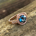 Rose Gold London Blue Topaz Ring with Diamond Halo and Band Accents