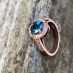 Rose Gold London Blue Topaz Ring with Diamond Halo and Band Accents