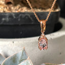 Rose Gold Oval Morganite Pendant with Trilogy Diamond Highlight