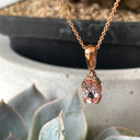 Rose Gold Oval Morganite Pendant with Trilogy Diamond Highlight