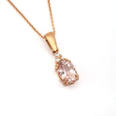 Rose Gold Oval Morganite Pendant with Trilogy Diamond Highlight