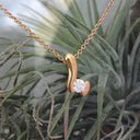 Rose Gold and Diamond Tension Set Diamond Drop Pendant