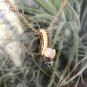 Rose Gold and Diamond Tension Set Diamond Drop Pendant