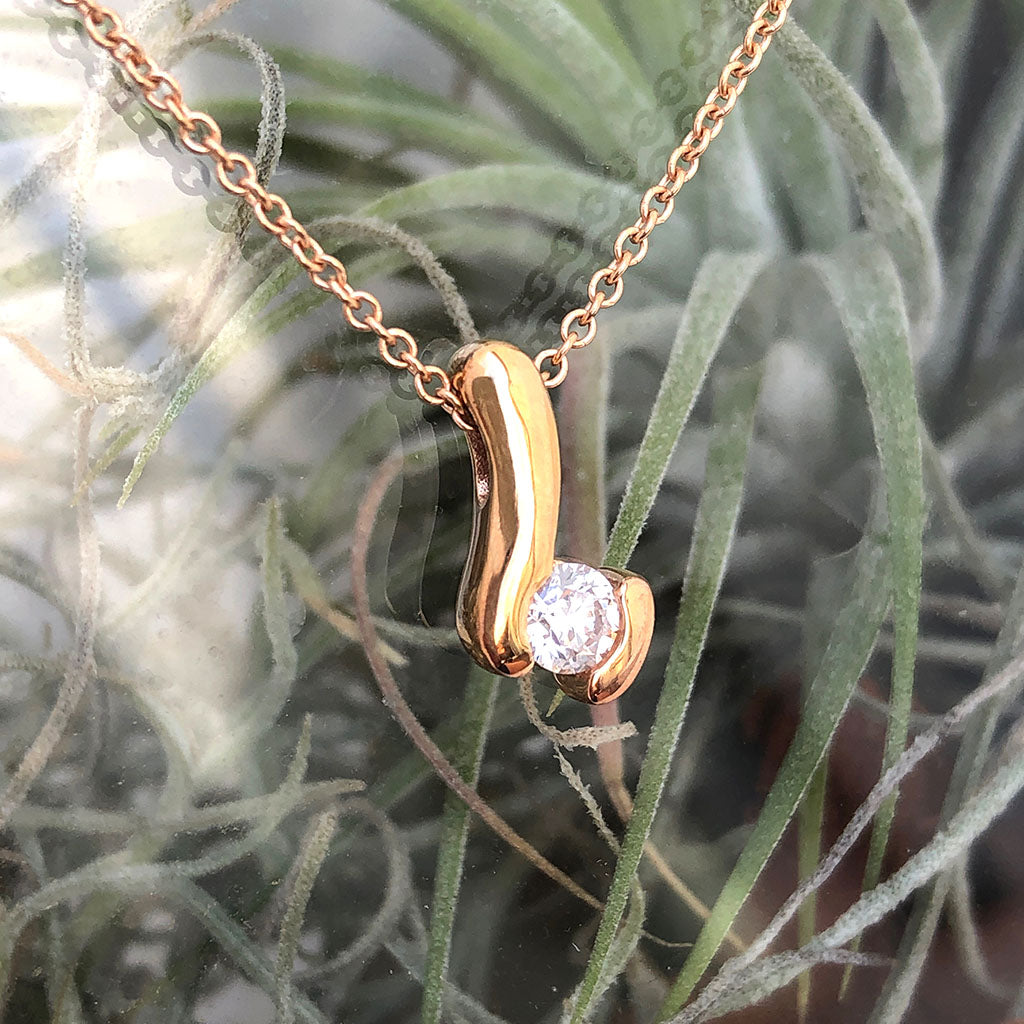 Rose Gold and Diamond Tension Set Diamond Drop Pendant