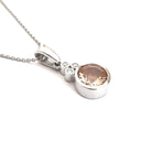 Round Cut Morganite with Diamond Trilogy Bale Accent Pendant