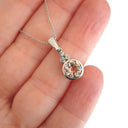 Round Cut Morganite with Diamond Trilogy Bale Accent Pendant