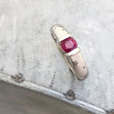 Ruby And Diamond Sprinkled Shoulder Ring