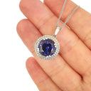 Scintillating Tanzanite and Double Diamond Halo Pendant