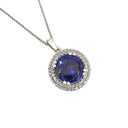 Scintillating Tanzanite and Double Diamond Halo Pendant
