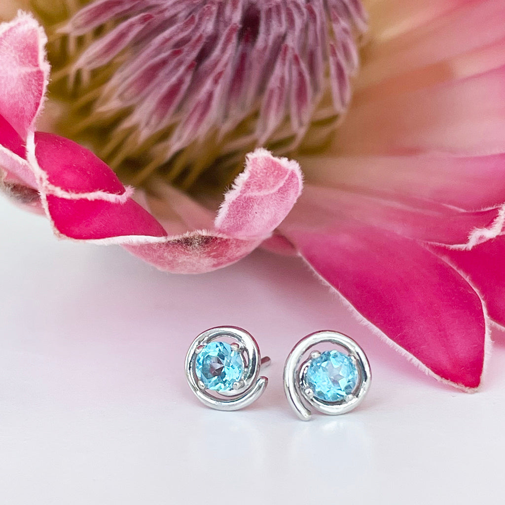 Silver Blue Topaz Spiral Studs