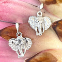 Silver Drop Elephant Relief Earrings