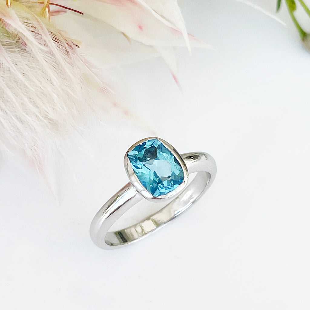 Silver Elongated Cushion Bezel Set Blue Topaz Ring Afrogem Jewellers