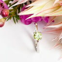 Silver Four Claw Solitaire Peridot Round Cut Ring