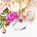 Silver Four Claw Solitaire Rhodolite Round Cut Ring