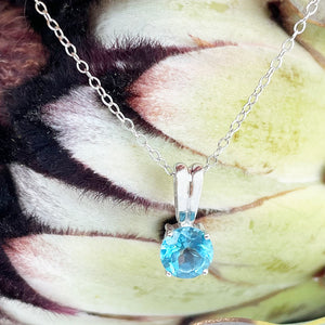 Silver Grooved Bale Round Blue Topaz Pendant