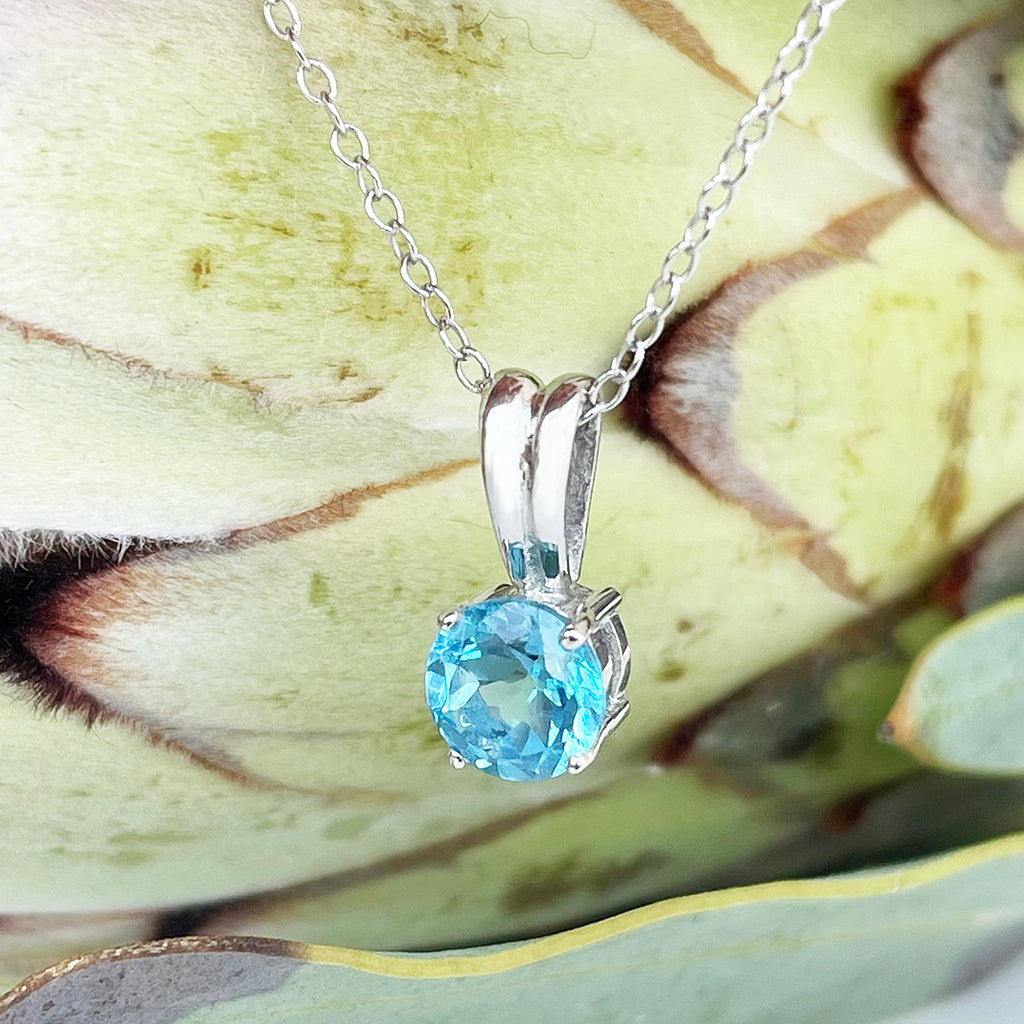 Silver Grooved Bale Round Blue Topaz Pendant