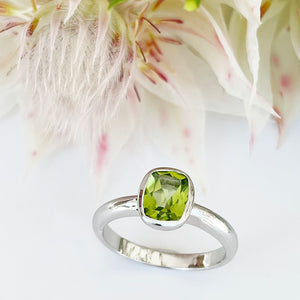 Silver Elongated Cushion Bezel Set Peridot Ring