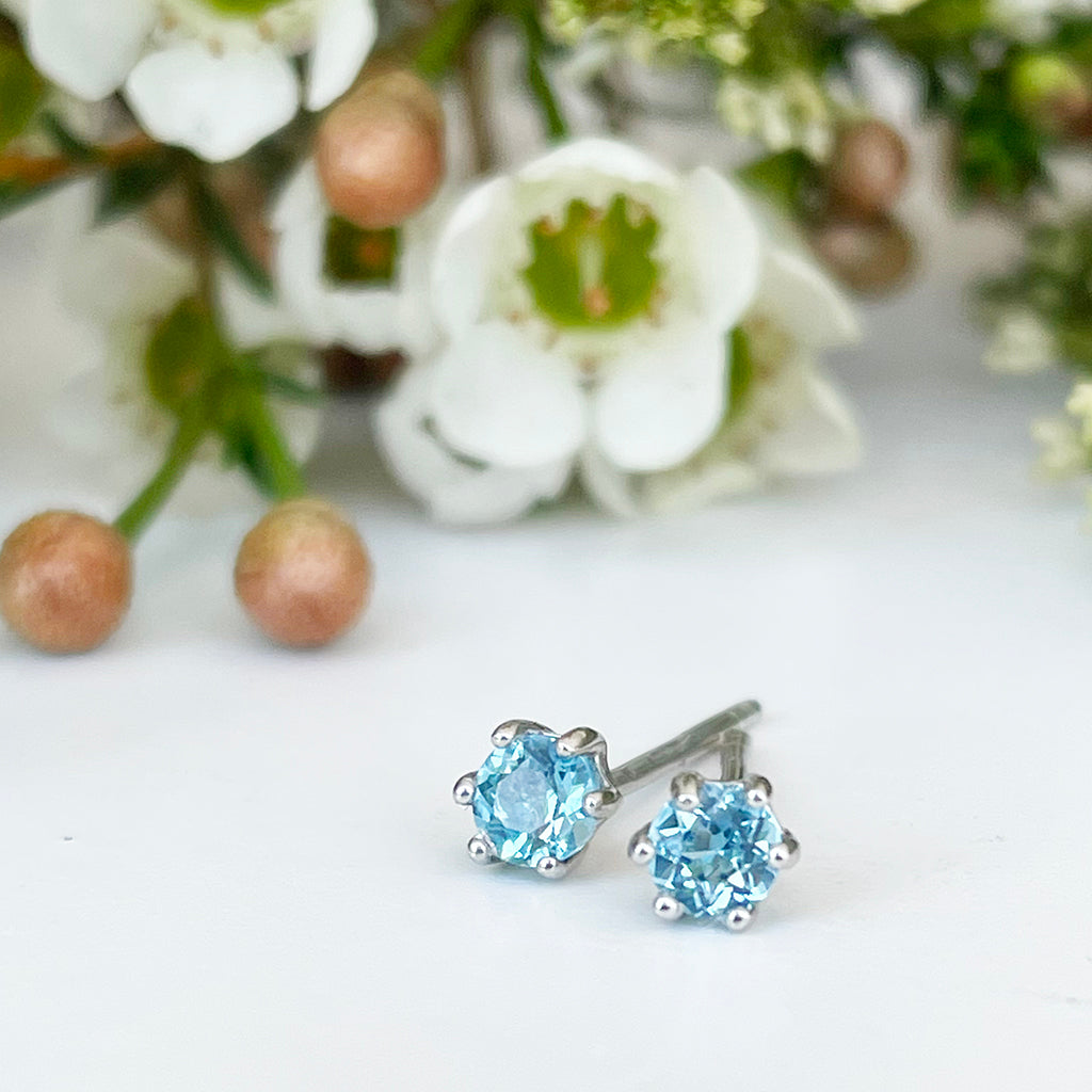 Silver Petite 6 Claw Blue Topaz Studs