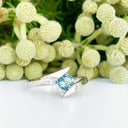 Silver Round Cut London Blue Topaz Twist Ring