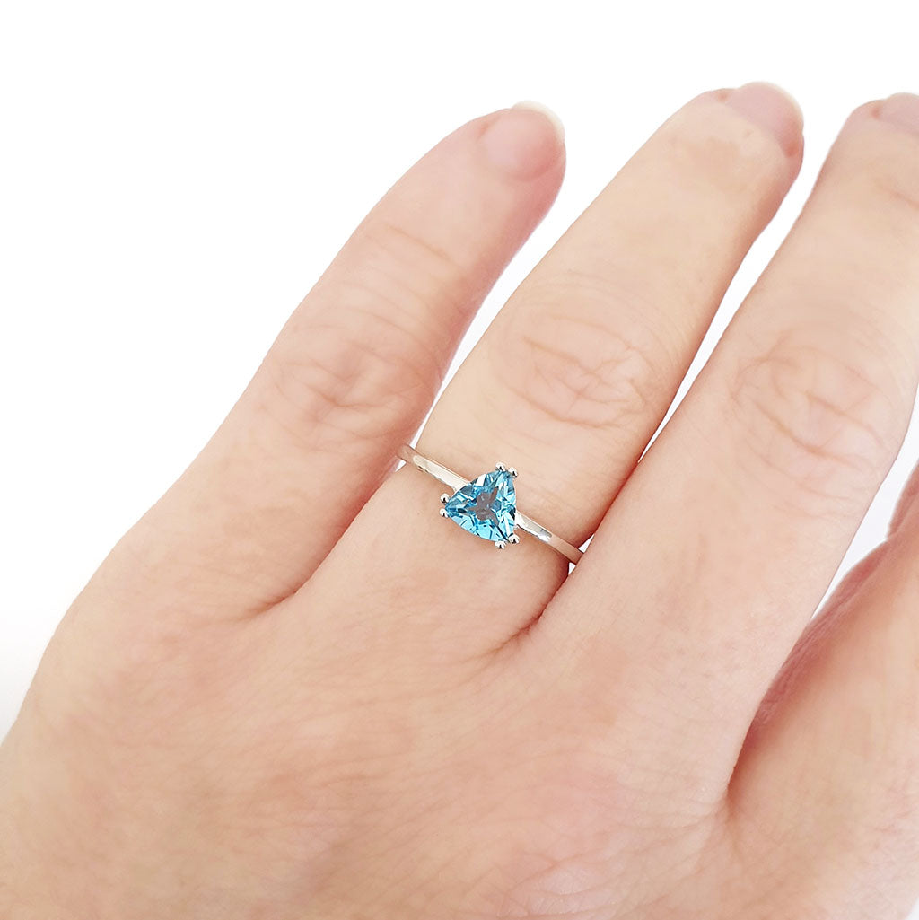 Silver Solitaire Blue Topaz Trilliant Cut Ring