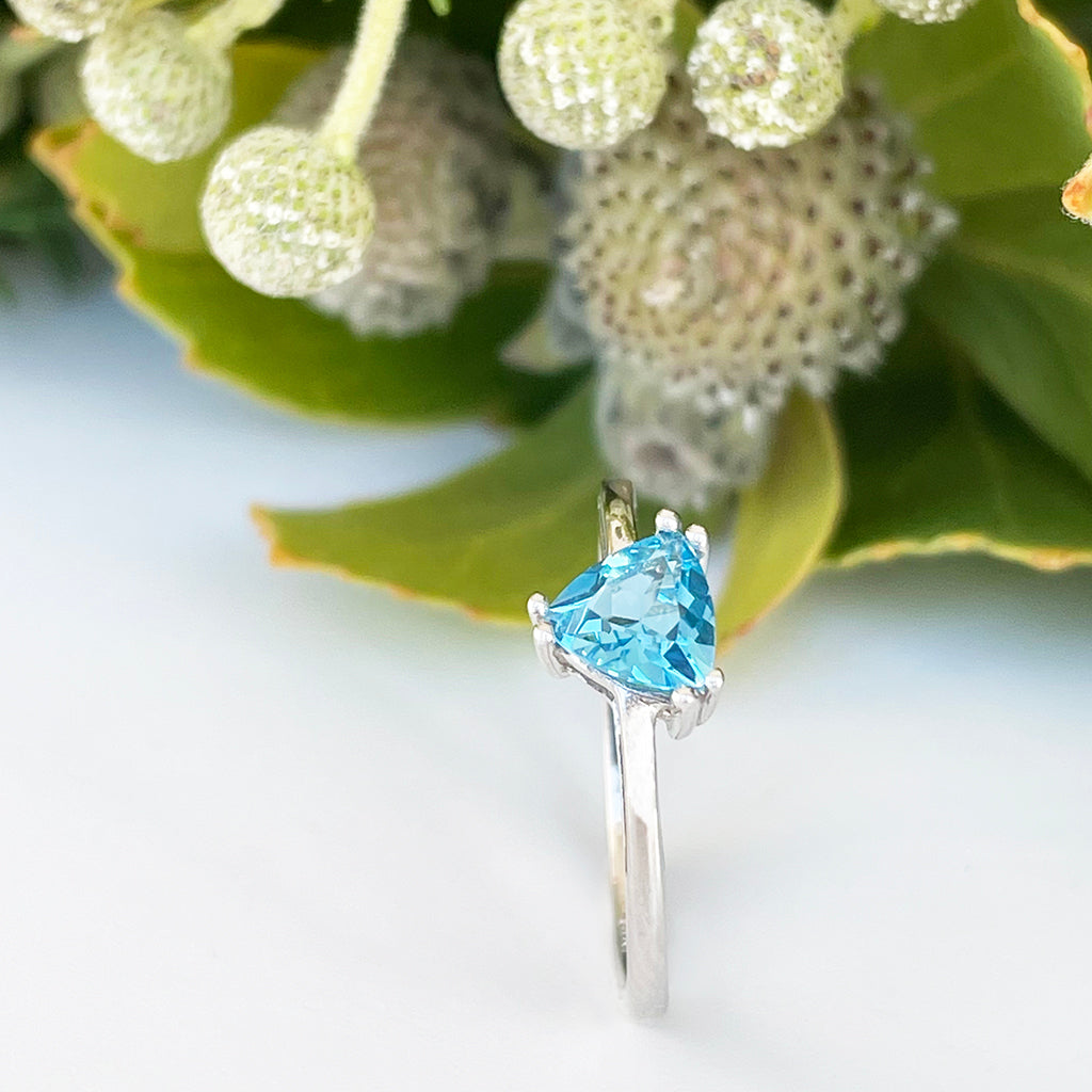 Silver Solitaire Blue Topaz Trilliant Cut Ring