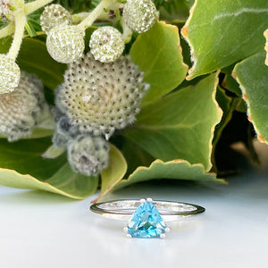 Silver Solitaire Blue Topaz Trilliant Cut Ring