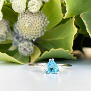 Silver Solitaire Blue Topaz Trilliant Cut Ring