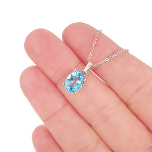 Silver Solitaire Oval Cut Pendant - Blue Topaz