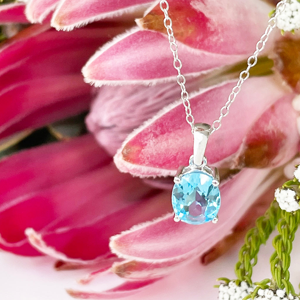 Silver Solitaire Oval Cut Pendant - Blue Topaz