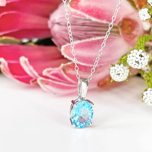 Silver Solitaire Oval Cut Pendant - Blue Topaz