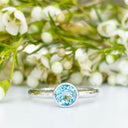 Silver Solitaire Round Tube Set Blue Topaz Ring