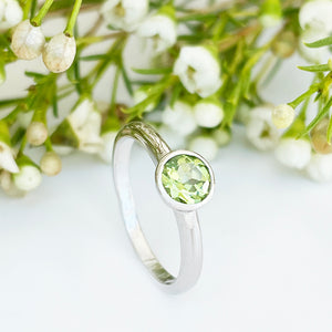 Silver Solitaire Round Tube Set Peridot Ring