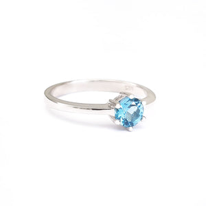 Silver Solitaire Six Claw Blue Topaz Ring