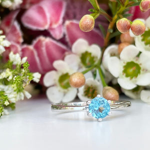 Silver Solitaire Six Claw Blue Topaz Ring